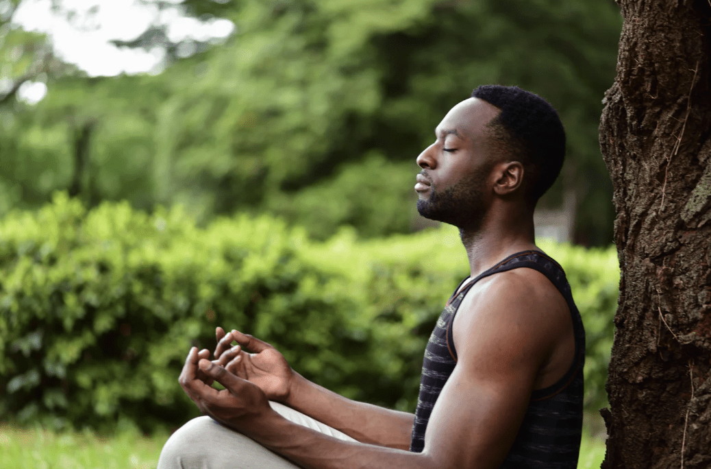 A man meditating.